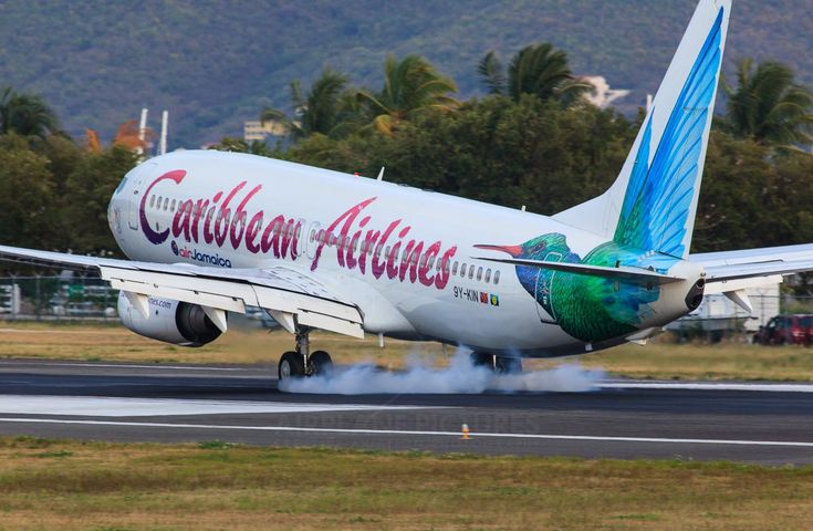A Caribbean Airlines aircraft landing