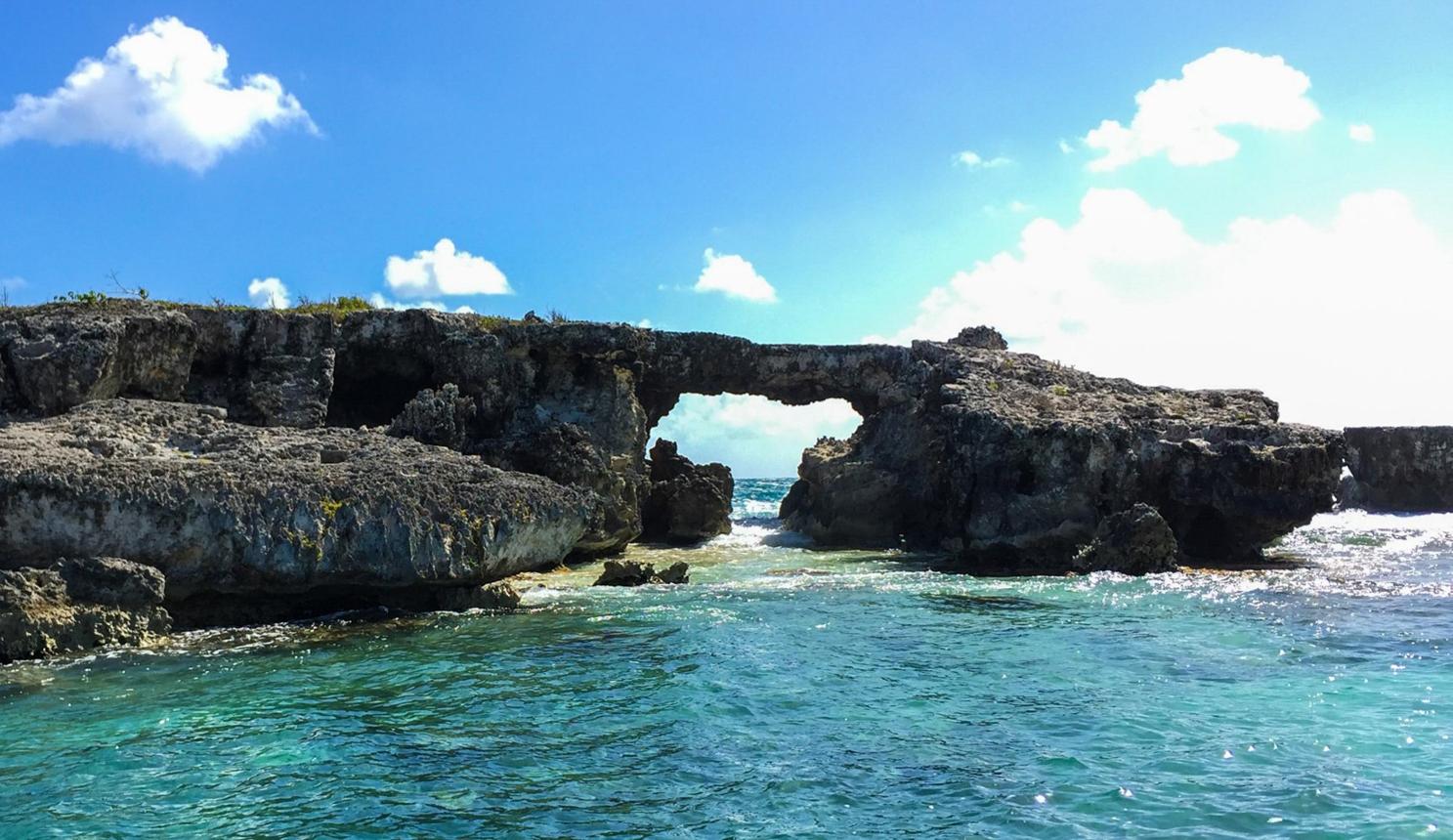 Devil''s Bridge natural limestone arch on Antigua''s Atlantic coast